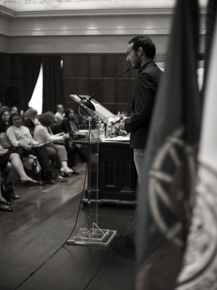 Nour addressing a speech